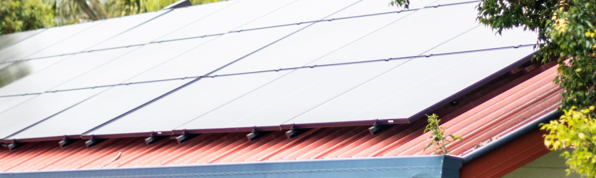 solar system on roof with trees