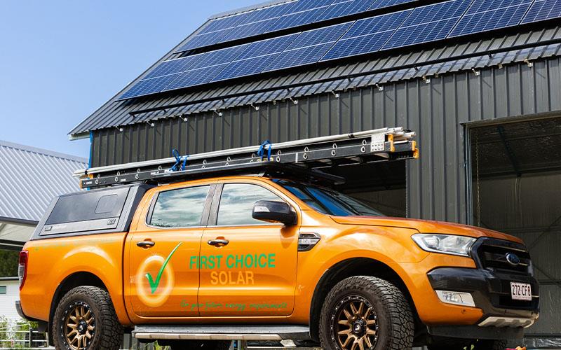 first choice solar ute in front of shed